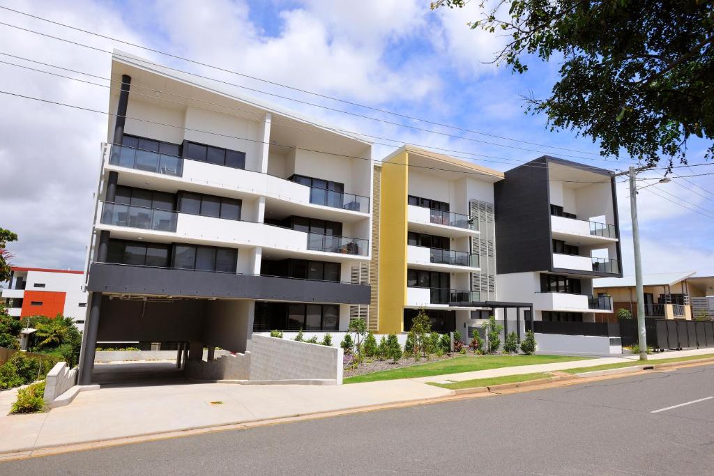 an apartment building on the side of a street at Apartments G60 Gladstone in Gladstone