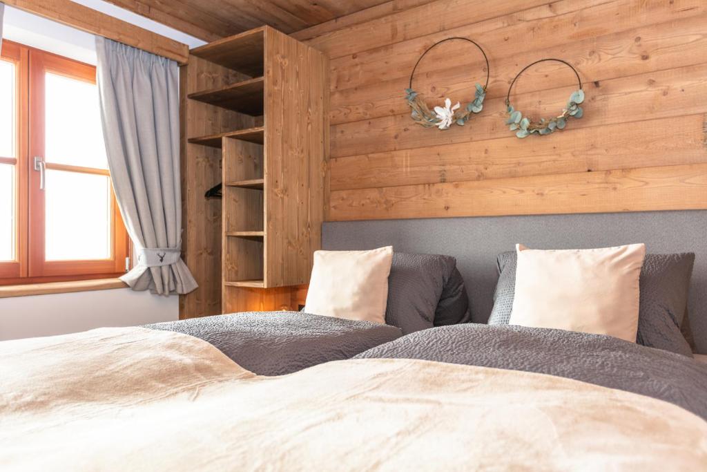 Voodi või voodid majutusasutuse Bergchalet am Hochkönig toas