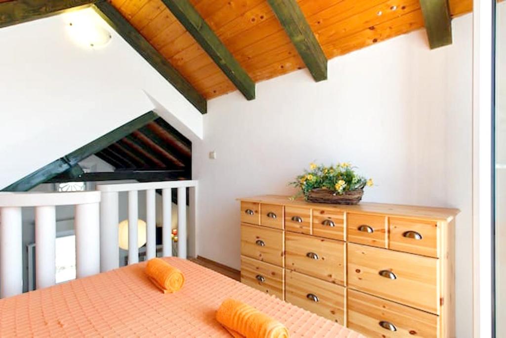 Postel nebo postele na pokoji v ubytování Charming Villa in Pučišća + Pool