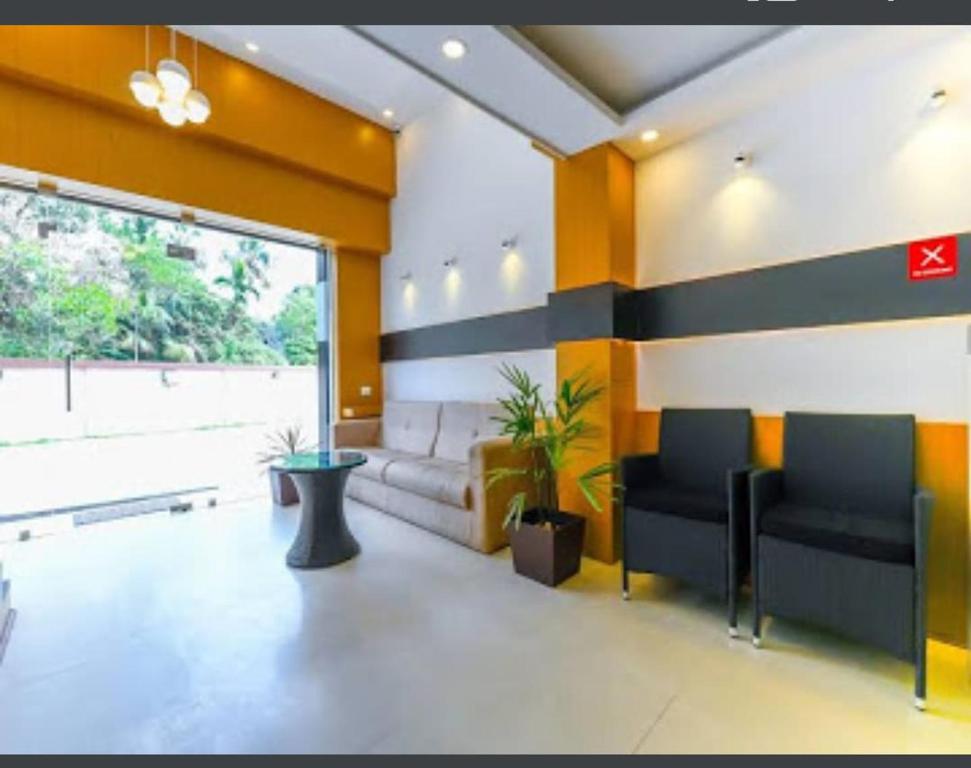 Posezení v ubytování HISHAM SUITES
