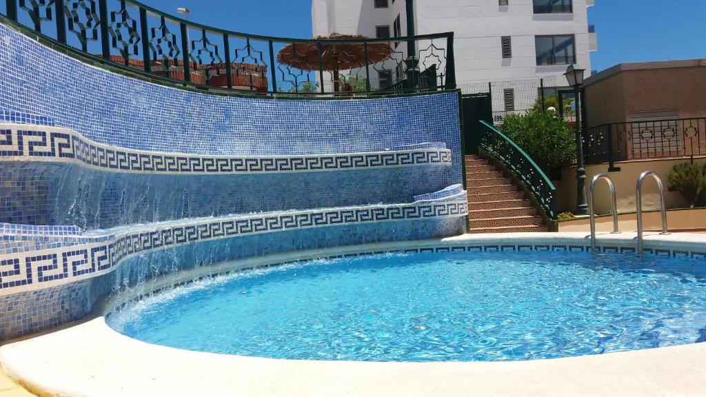 Bazén v ubytovaní Apartamento La Mezquita alebo v jeho blízkosti