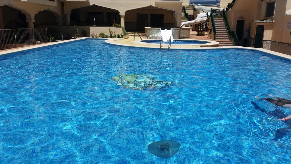 Bazén v ubytovaní Apartamento La Mezquita alebo v jeho blízkosti