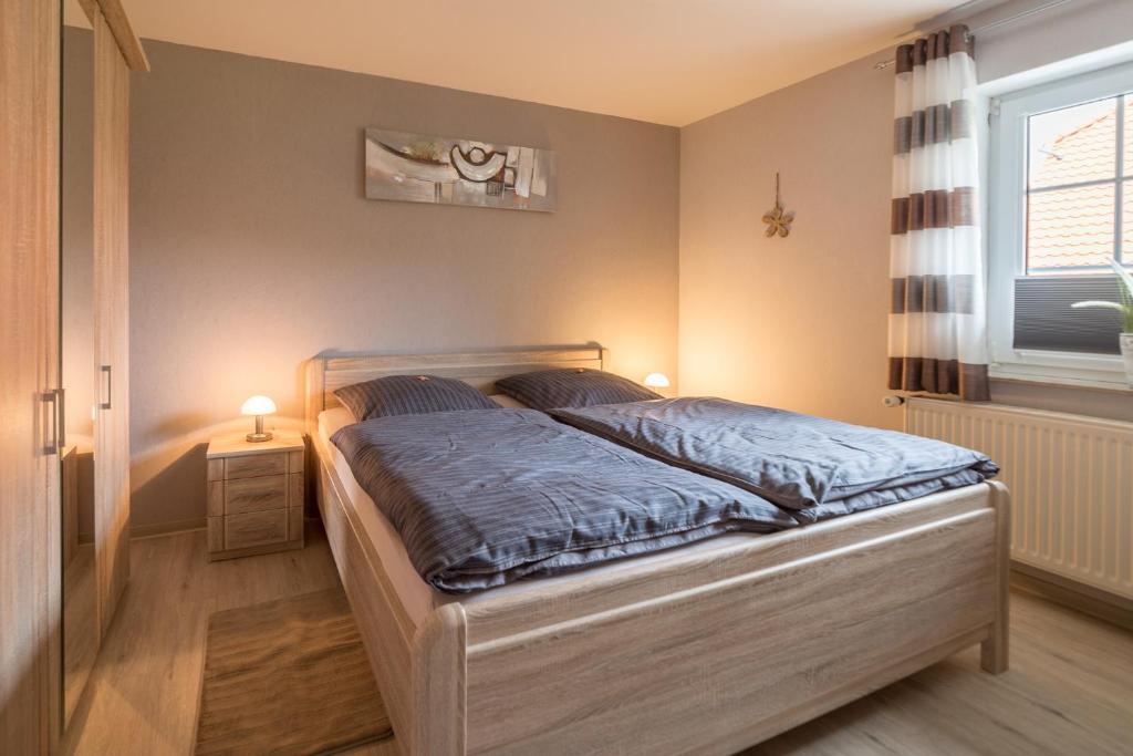 Postel nebo postele na pokoji v ubytování Ferienwohnung Pieper