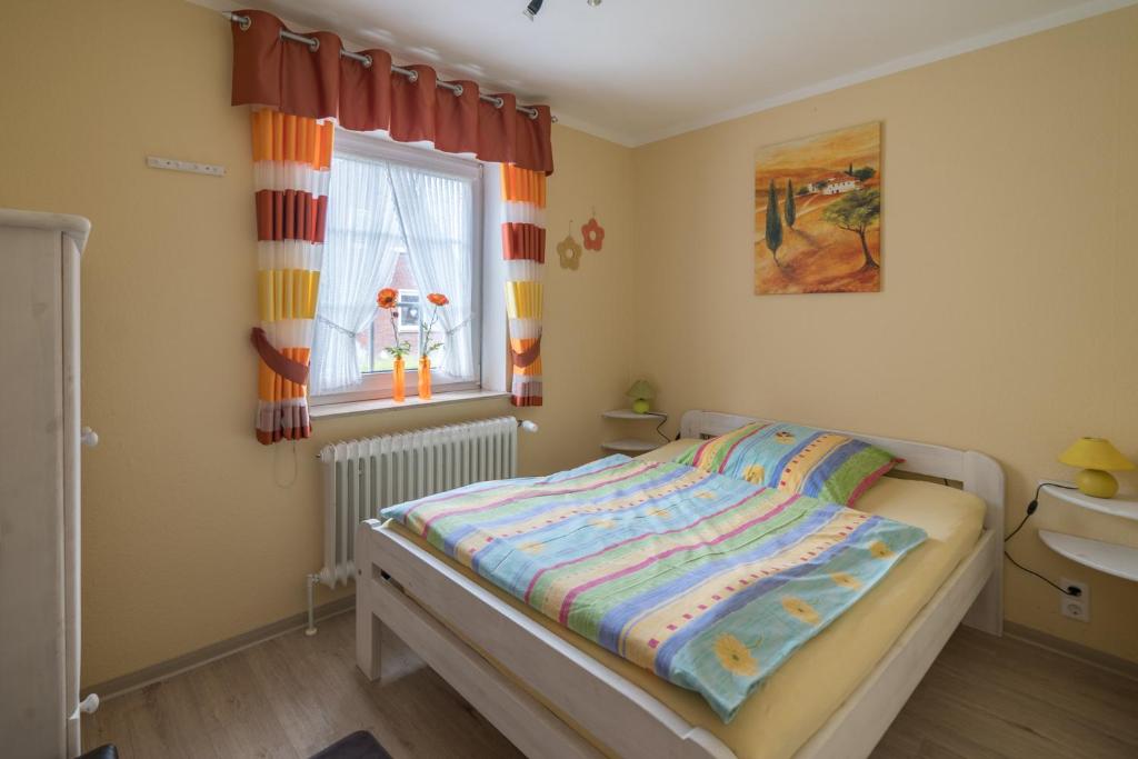 Postel nebo postele na pokoji v ubytování Ferienwohnung Pieper