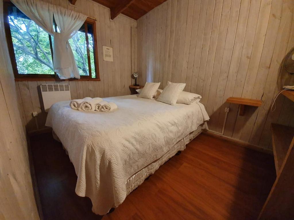 Postel nebo postele na pokoji v ubytování Hola Pucon