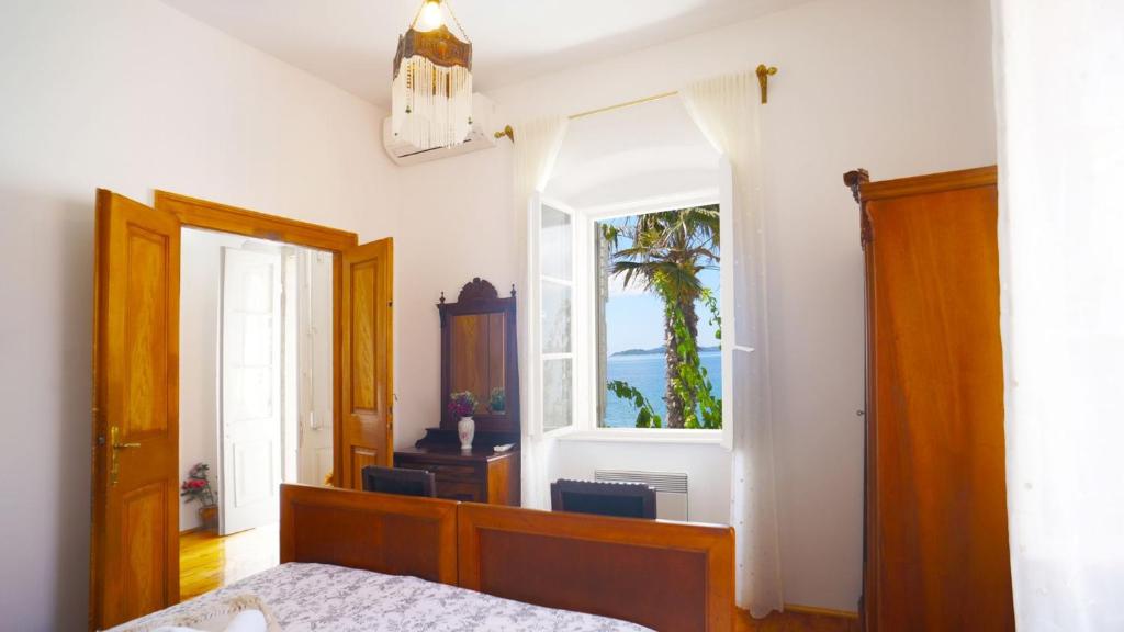 Postel nebo postele na pokoji v ubytování Villa Beach House Orebic with private pool at the beach in Orebic - Peljesac