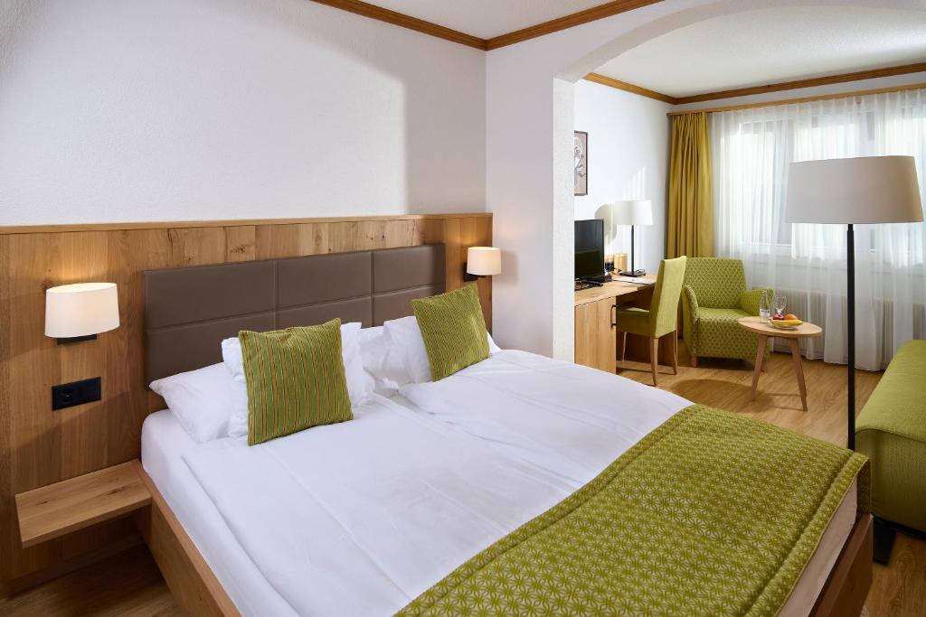 Postel nebo postele na pokoji v ubytování Hotel Bristol Relais du Silence Superior