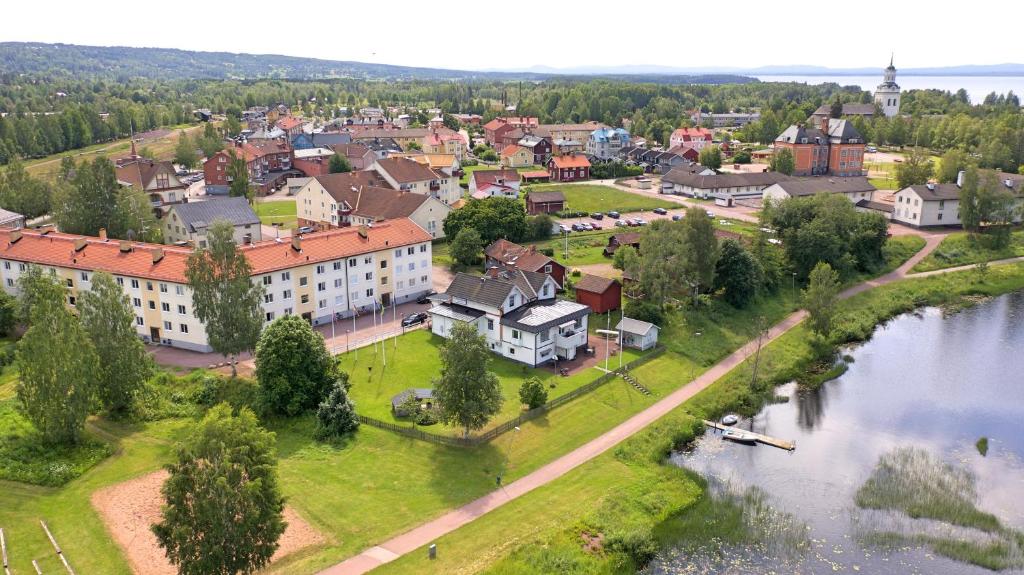 an aerial view of a town next to a river at Hotell Strandvillan B&B in Orsa