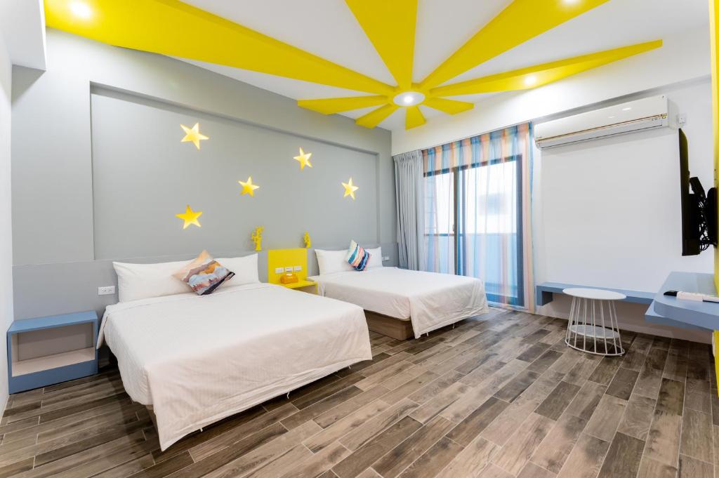 Postel nebo postele na pokoji v ubytování Haipai Sweetheart Homestay