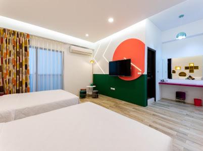 Postel nebo postele na pokoji v ubytování Haipai Sweetheart Homestay