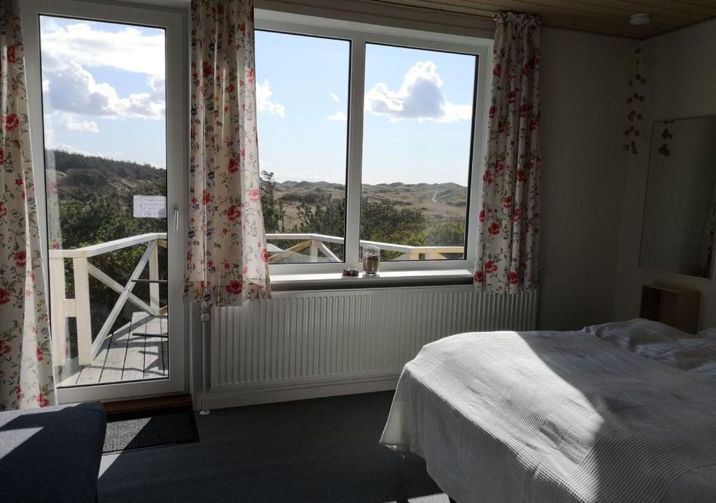 Postel nebo postele na pokoji v ubytování Munchs Badehotel
