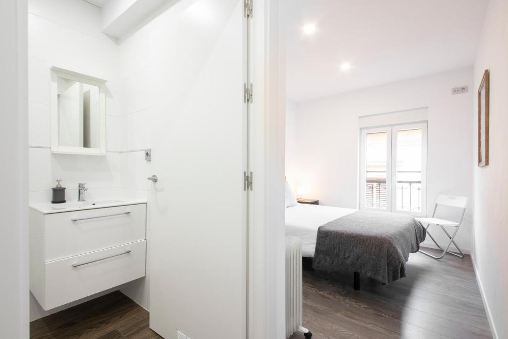 Posteľ alebo postele v izbe v ubytovaní San Juan Guesthouse