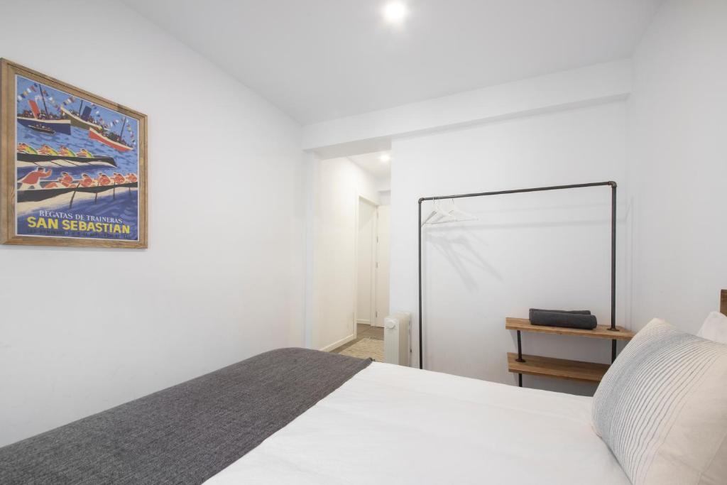 Posteľ alebo postele v izbe v ubytovaní San Juan Guesthouse
