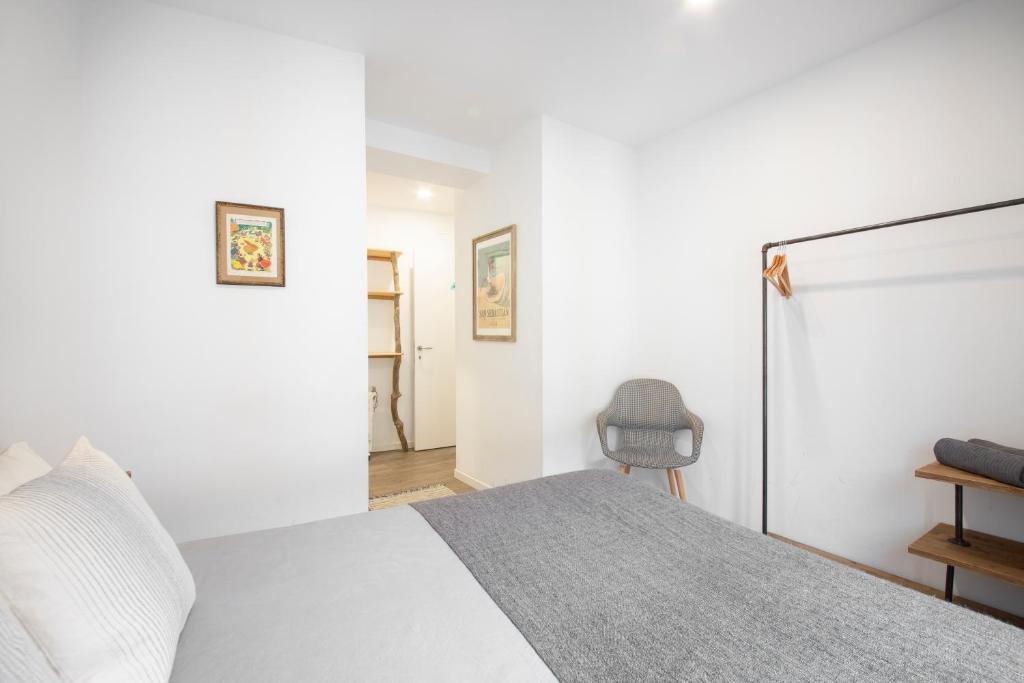 Posteľ alebo postele v izbe v ubytovaní San Juan Guesthouse