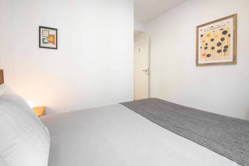 Posteľ alebo postele v izbe v ubytovaní San Juan Guesthouse