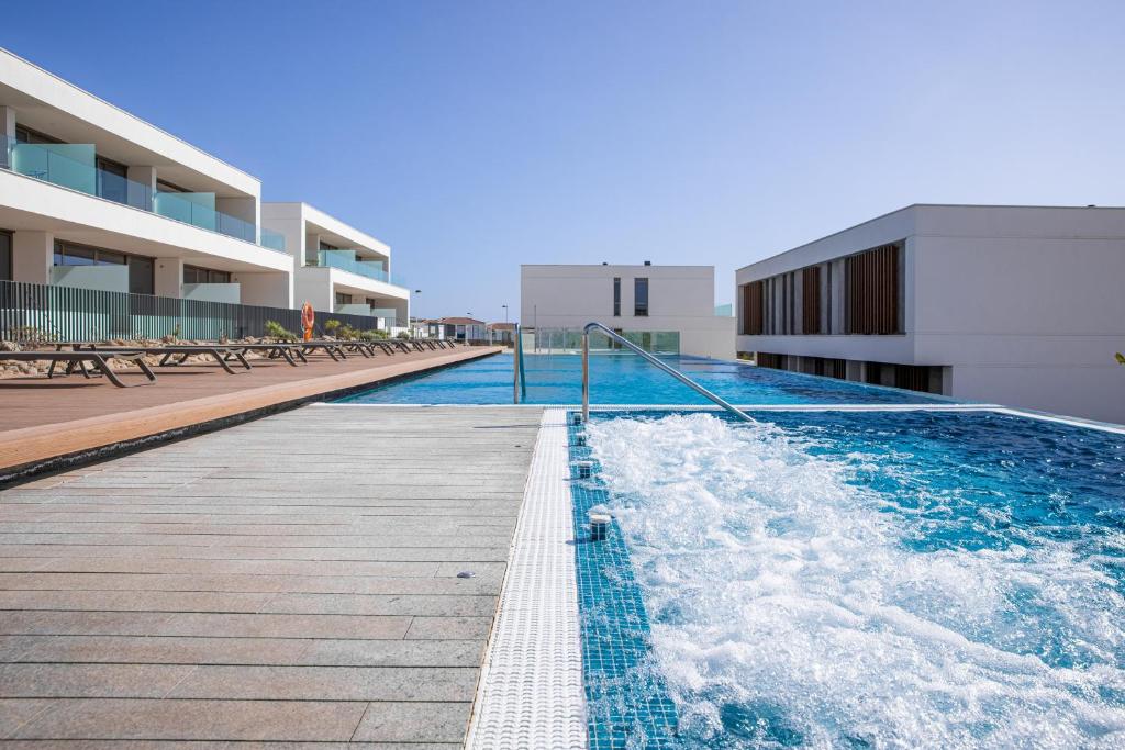 Bazén v ubytování Kora Nivaria Beach nebo v jeho okolí