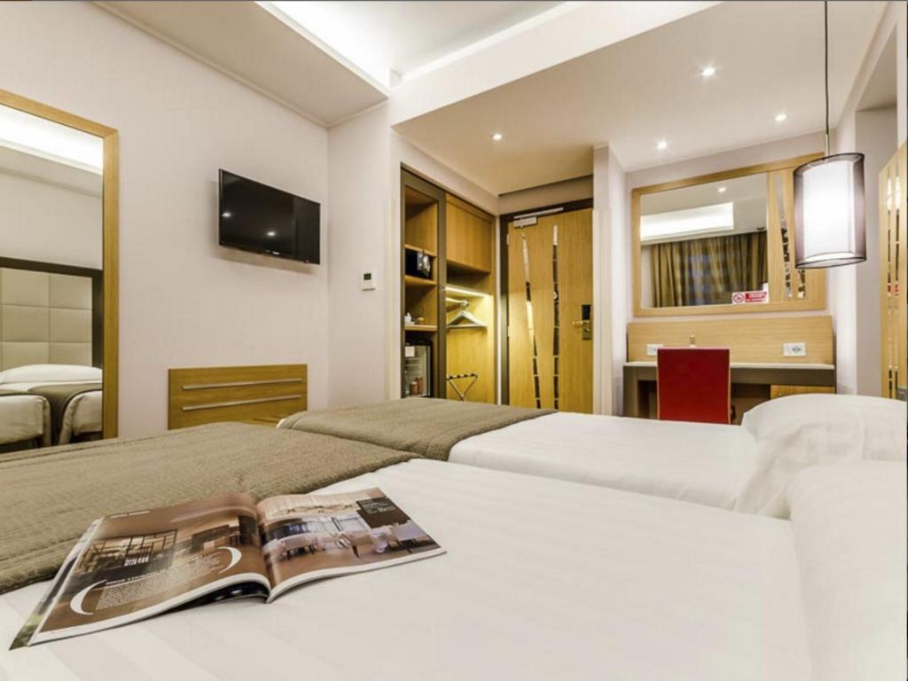 TV a/nebo společenská místnost v ubytování Hotel Giolli Nazionale