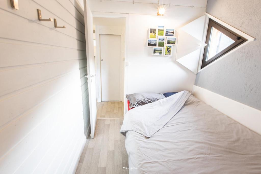 Postel nebo postele na pokoji v ubytování Gîte Le Petit Arbizon