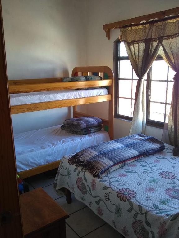 Postel nebo postele na pokoji v ubytování Posada de Los Reyes