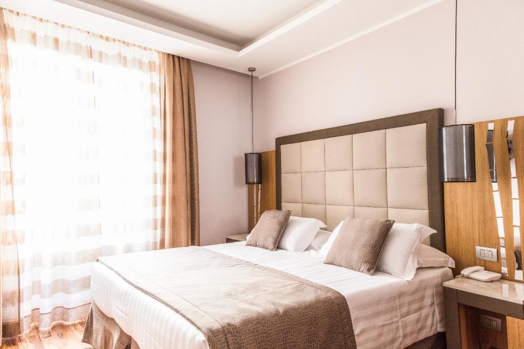 Posteľ alebo postele v izbe v ubytovaní Vibe Nazionale
