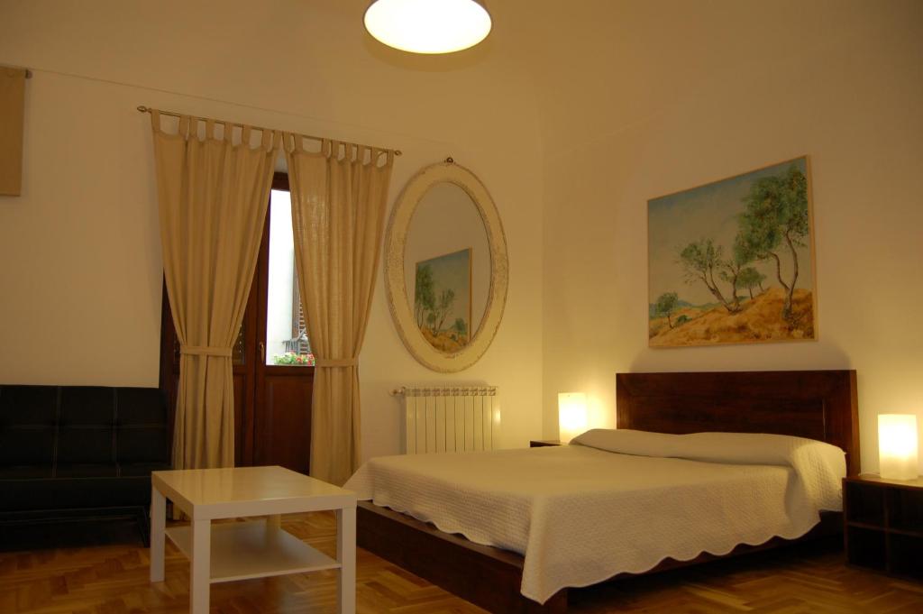 Posteľ alebo postele v izbe v ubytovaní Federico Secondo B&B
