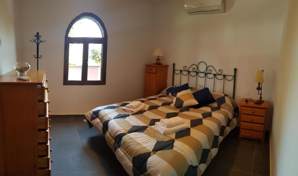 Postel nebo postele na pokoji v ubytování Casitas Gutiérrez