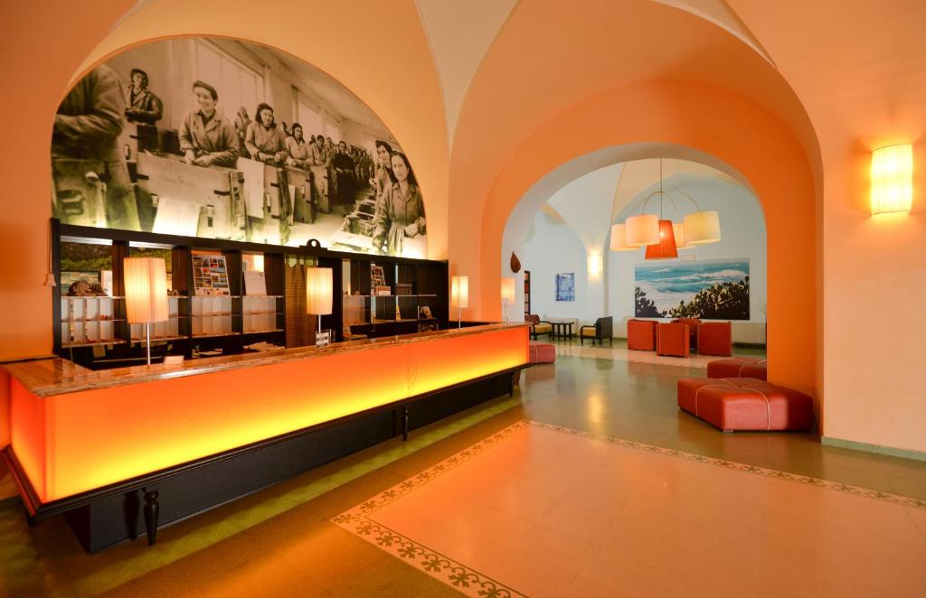 Posezení v ubytování Il Tabacchificio Hotel