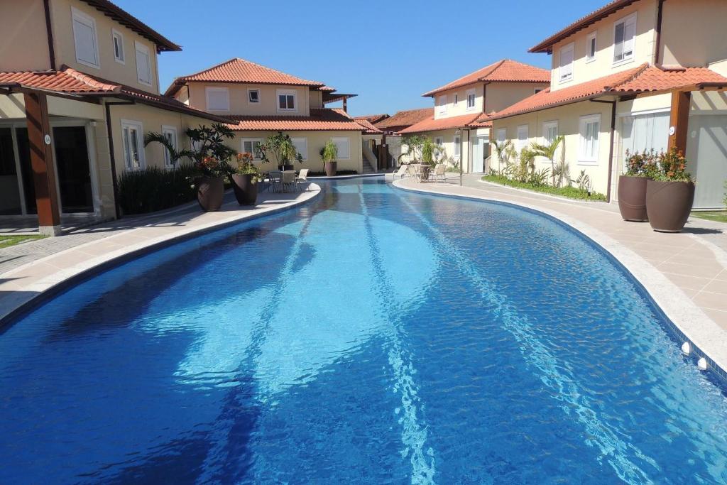  Casa com 3 quartos em condomínio 290m da praia de Geribá