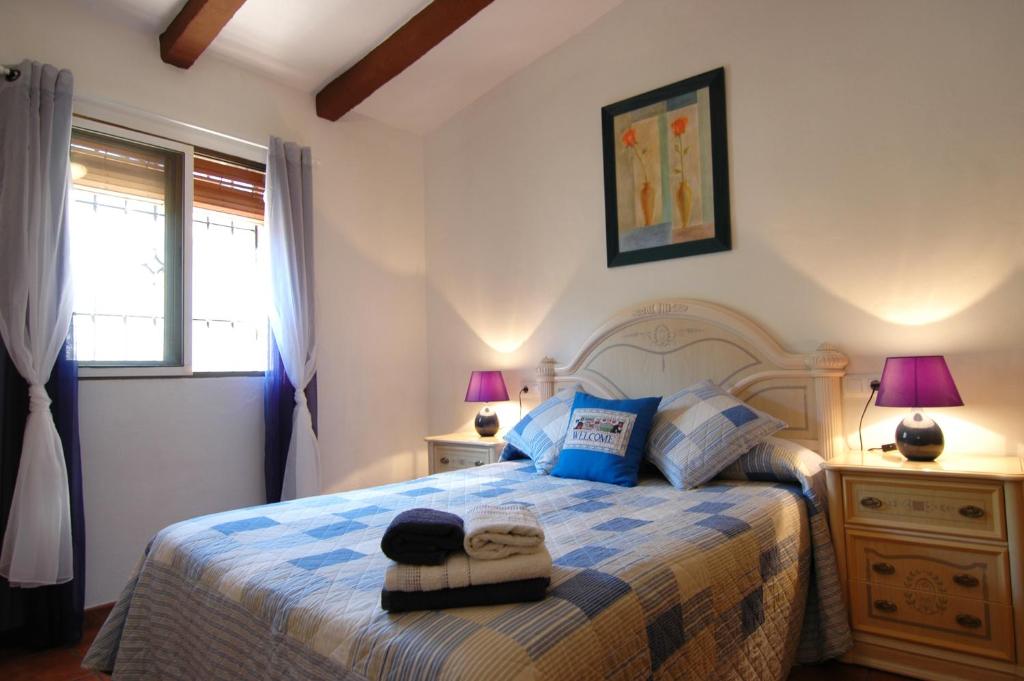 Posteľ alebo postele v izbe v ubytovaní Cortijo Mirador Casitas Select