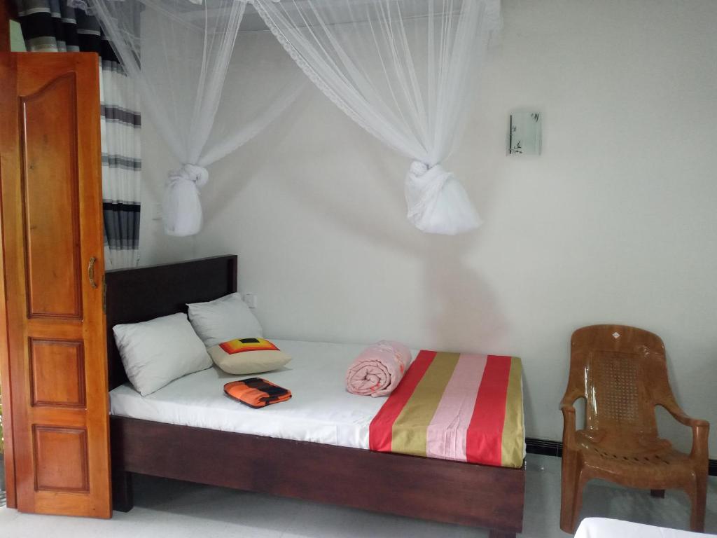 Postel nebo postele na pokoji v ubytování Mellow Homestay