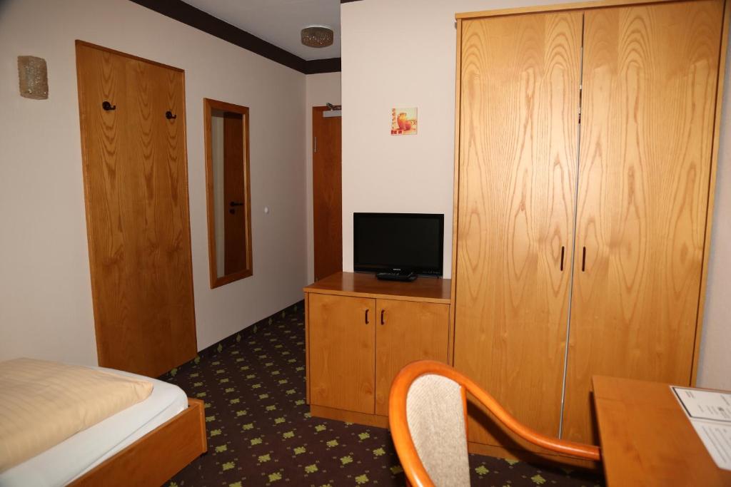 TV a/nebo společenská místnost v ubytování Hotel Taunus Residence