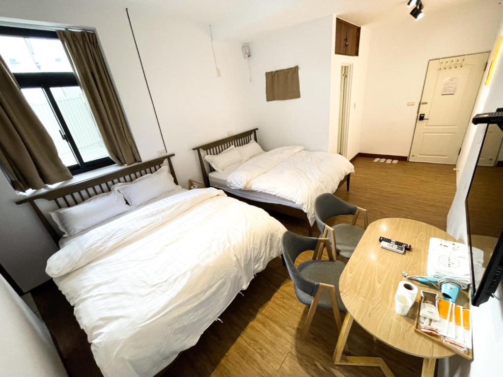 Postel nebo postele na pokoji v ubytování Small Island Homestay