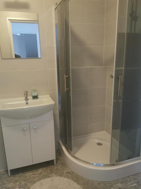 Kúpeľňa v ubytovaní Apartamenty Hejszowina