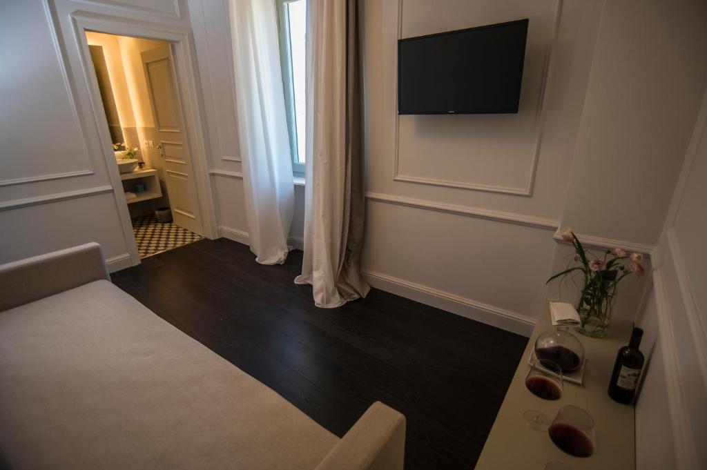 TV a/nebo společenská místnost v ubytování Isola Polvese Resort