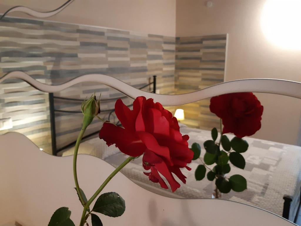 Łóżko lub łóżka w pokoju w obiekcie Laurus Jacuzzi villa Alghero Valverde 122