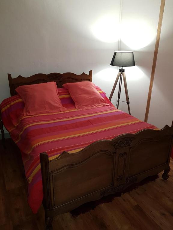 Postel nebo postele na pokoji v ubytování Chambres d'hôtes les 2G