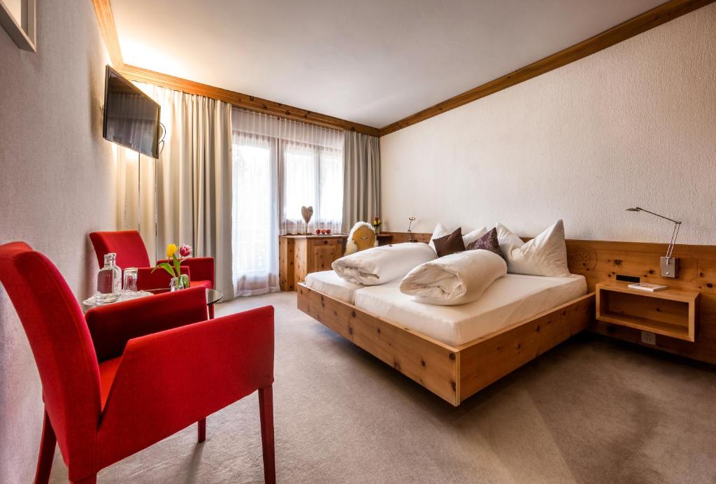 Postel nebo postele na pokoji v ubytování Hotel Seehof