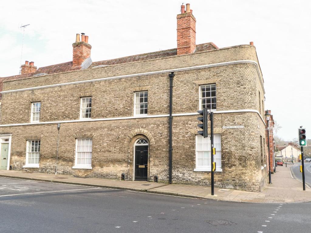 a large brick building on the corner of a street at Enterprise House in Bury Saint Edmunds