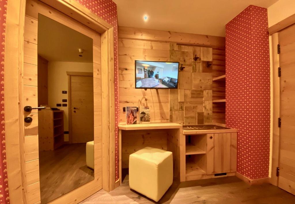 TV a/nebo společenská místnost v ubytování Hotel Laurino