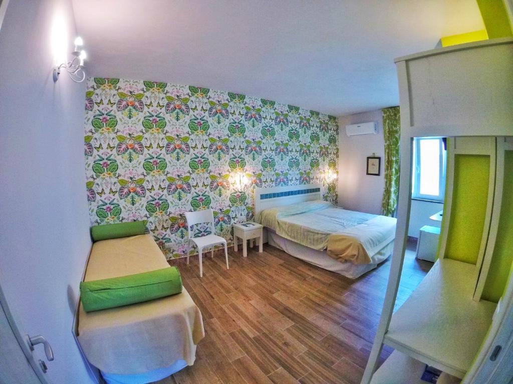 Posteľ alebo postele v izbe v ubytovaní Aramoni B&B