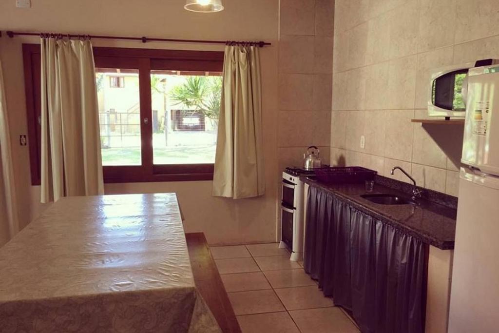  Excelente casa 50 metros da praia