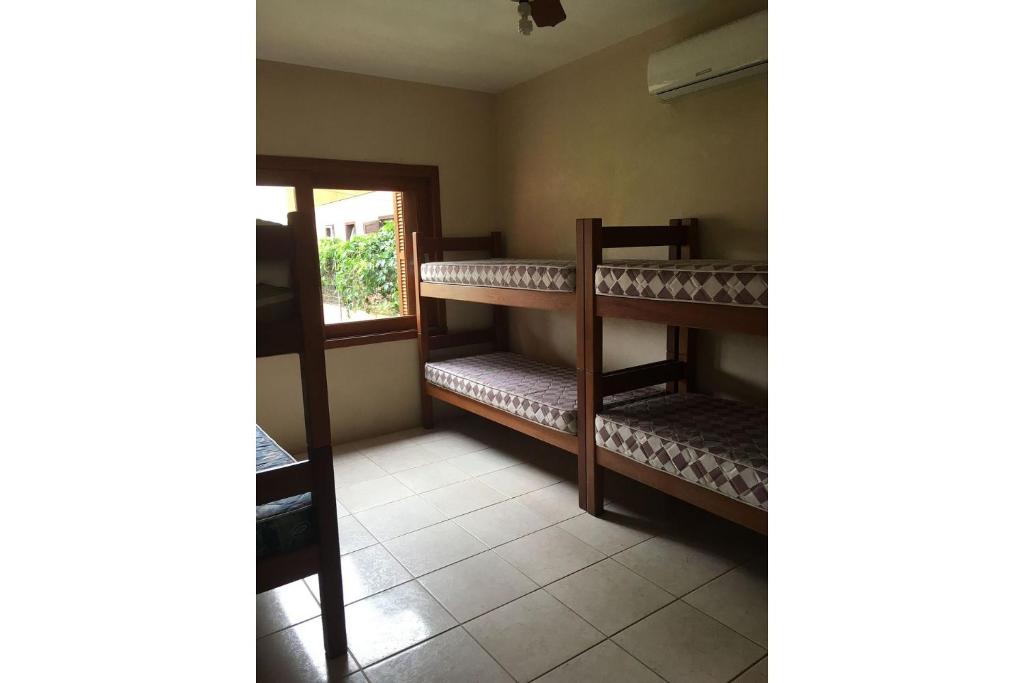  Excelente casa 50 metros da praia