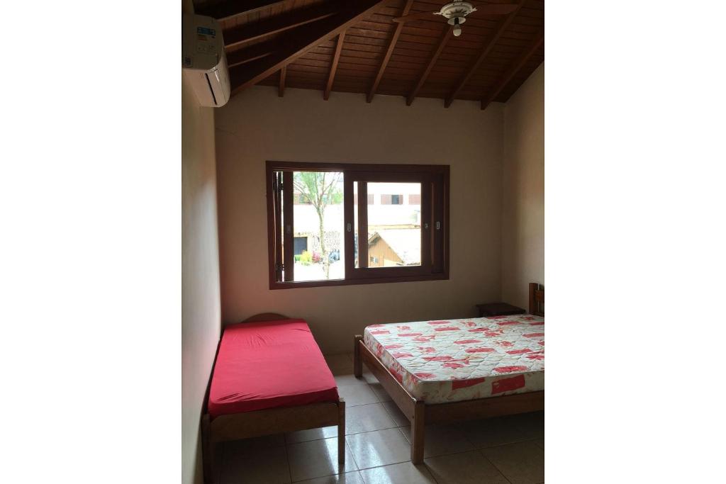  Excelente casa 50 metros da praia