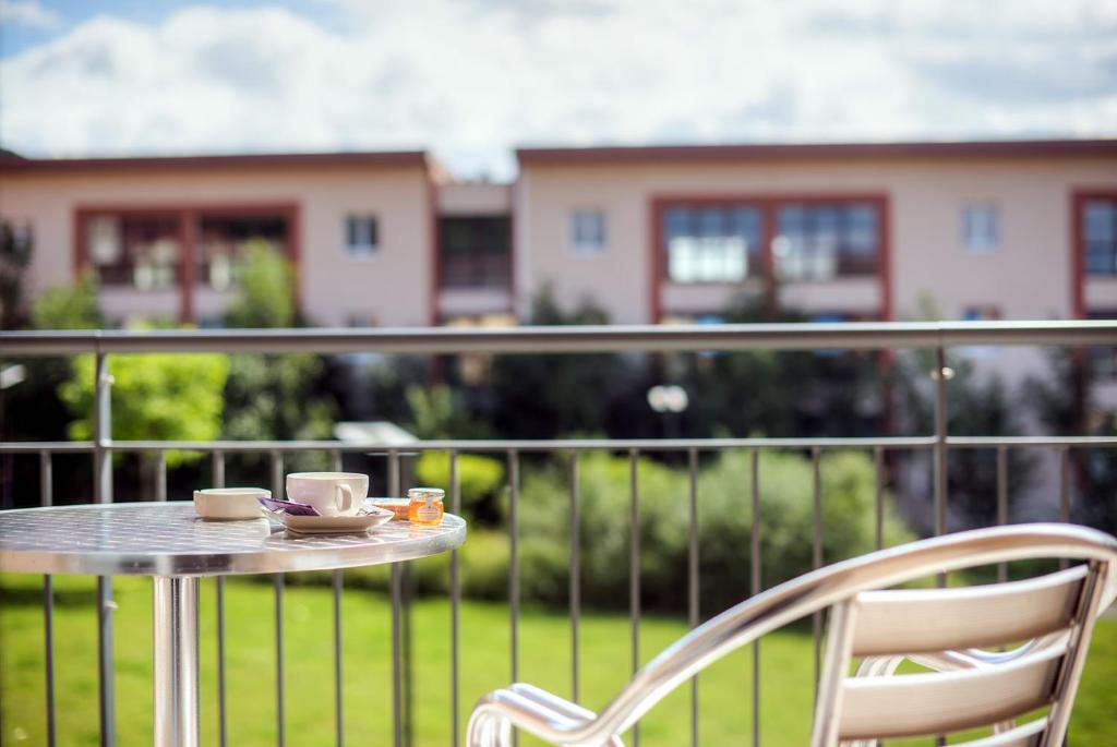 Balkón nebo terasa v ubytování Comfort Aparthotel Mutzig Portes d'Alsace