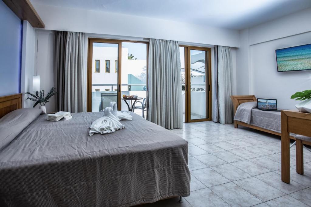 Łóżko lub łóżka w pokoju w obiekcie Mary Hotel & Mary Royal Suites