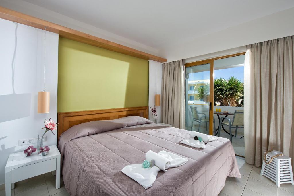 Łóżko lub łóżka w pokoju w obiekcie Mary Hotel & Mary Royal Suites