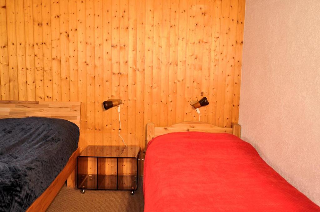 Postel nebo postele na pokoji v ubytování Melchior