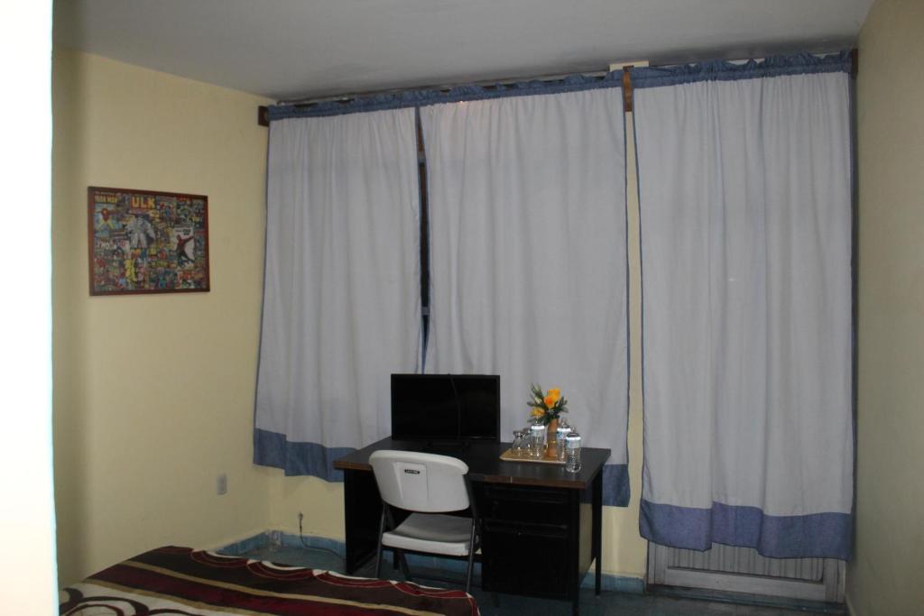 TV a/nebo společenská místnost v ubytování Posada de Vick