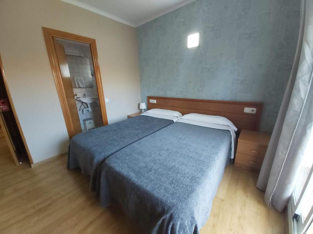 Postel nebo postele na pokoji v ubytování Hotel 139