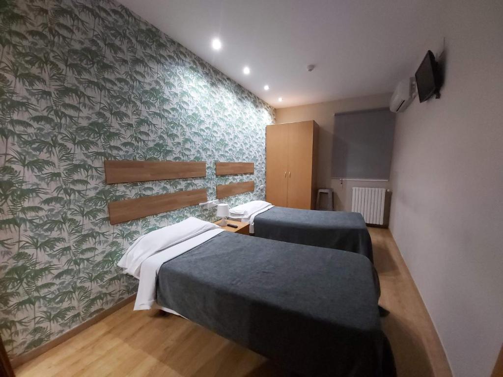 Postel nebo postele na pokoji v ubytování Hotel 139